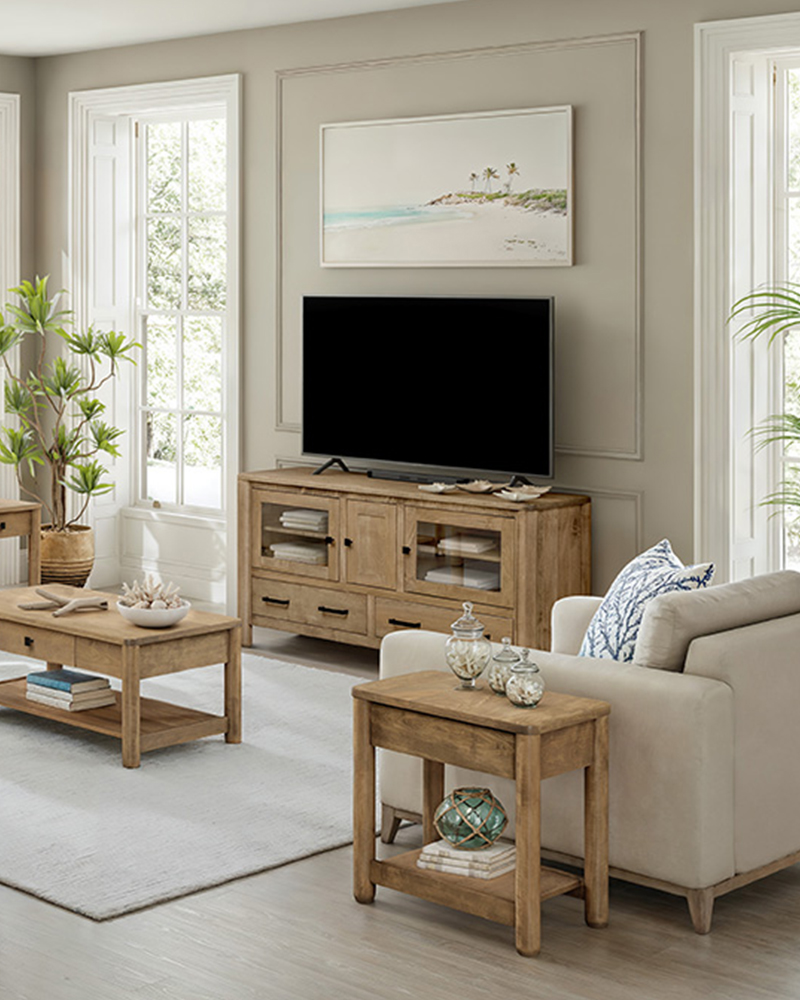 Living room furniture with wood TV console, coffee table, and side table
